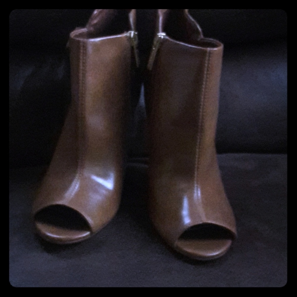 Beautiful tan color open toe boots by guess
